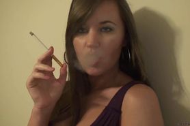 Really beautiful girl with blue eyes smoking and teasing!
