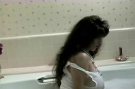 Busty girl in bath