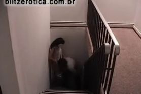 Sex with brunette on the stairs of the hall