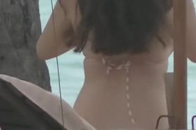 Spying a busty teen girl at the beach