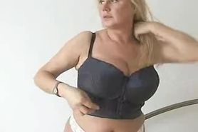 Blonde Milf  Lathers Lotion All Over Her Massive Knockers
