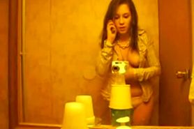 Hot girl strips naked on her cell phone