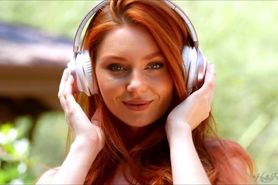 Into the beat with redhead Lacy Lennon striptease in her bikini at poolside