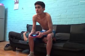 Hot twink sits on his sub's face and plays some PS4.