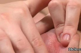 Lovely teenie is opening up wet snatch in closeup and getting off