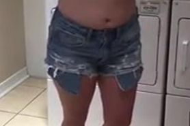 Flashing big boobs in a laundromat
