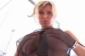 Sexy mature lady with big tits takes a shower