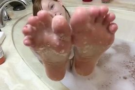 Young Girl Teasing Her Wet Feet