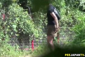 Japanese ho pees in park