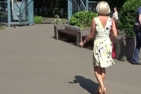 Blonde Pissing in a Public Park.