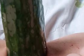 Girl masturbating with big cucumber. Lina Moore