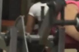 Voyeur hottie in gym in shorts