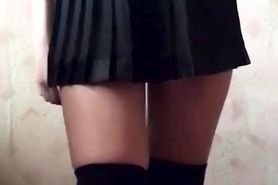 Dancing schoolgirl with beautiful legs and big ass