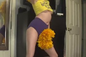 SEXY REDHEADED CHEERLEADER strips down in front of the MIRROR!