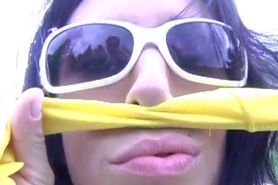 Goddess Extreme Kream takes off her yellow bikini to masturbate and squirts while wearing only her white sunglasses.