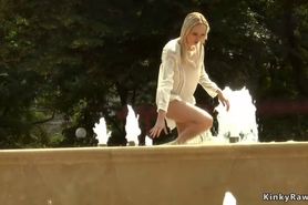 Blonde made to bath in public fountain
