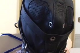 Chained and shackled hooded Asian cheerleader wand orgasms