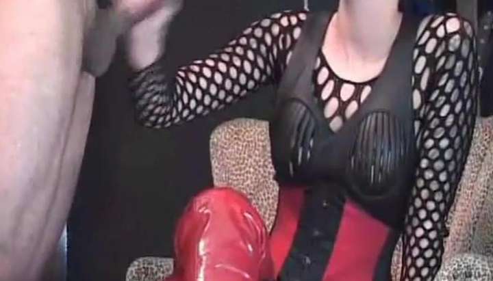 Lady in high red boots doing handjob TNAFlix Porn Videos